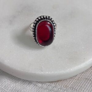 Elegant Silver and Red Gemstone Ring
